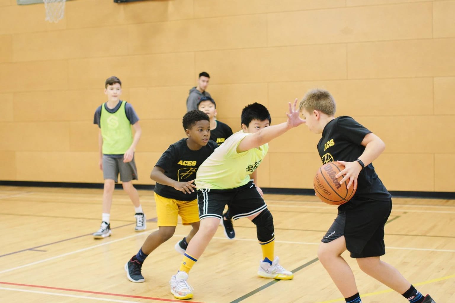 Young basketball players during training